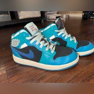 Boys teal Air Jordan 1